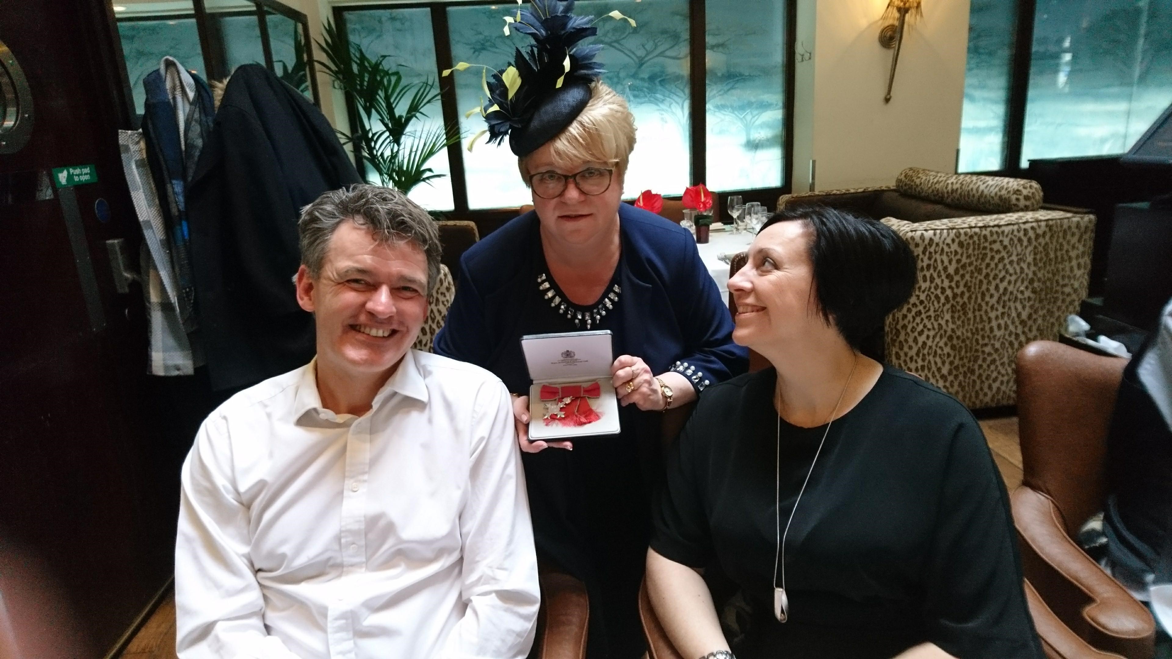 Mark Dawe, Debbie Gardiner, and Karen Kelly smiling for a photo at bbar on Buckingham Palace Road